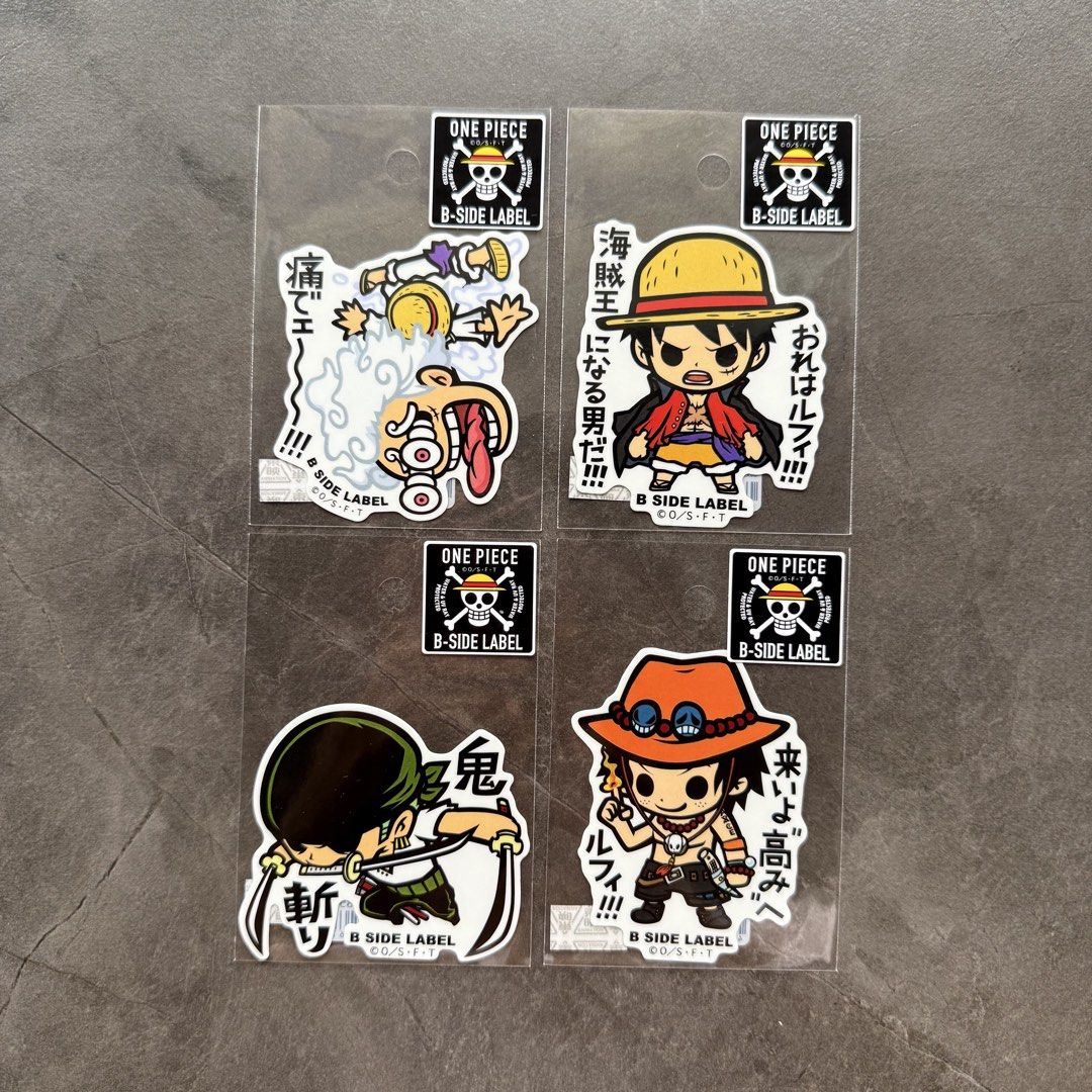 Authentic One Piece B Side Label Stickers [4 pcs] (Category: Art & Prints) located in Manila. Submitted by shoppolaflora (Listing ID 1467422586, Image 1). Description: - Set of 4 authentic B Side Label One Piece stickers - JUMP Shop official Japan store, bought directly - Gear 5 Luffy, Luffy, Zoro, Ace - Brand new, sealed in original individual clear plastic sleeves [₱800 for set of 4, ₱250 if per piece] .