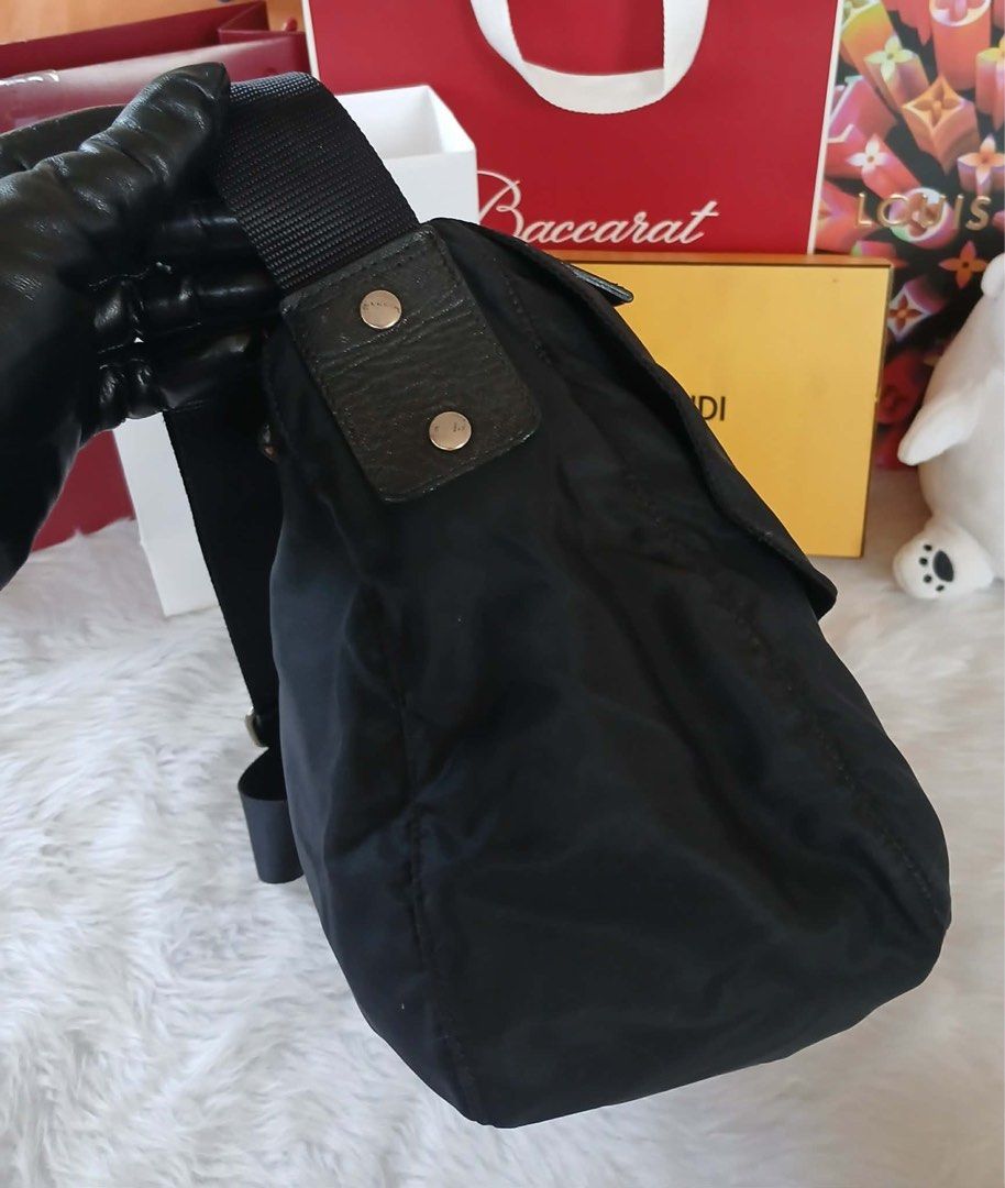 Authentic Prada messenger Bag (Category: Luxury Bags & Wallets) located in Quezon City. Submitted by jhaediah (Listing ID 1467515036, Image 2). Description: Good condition Authentic No inclusion.