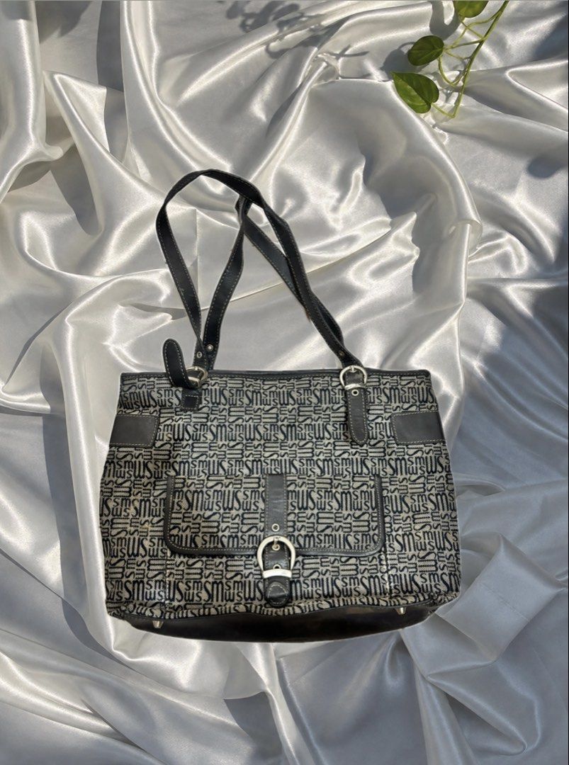 Authentic Vintage Stone Mountain monogram canvas shoulder bag (Category: Shoulder Bags) located in Santa Rosa. Submitted by willow.marae (Listing ID 1467429755, Image 1). Description: - no zipper - no other issues except the zipper - pretty details! - ideal for school/office use - tote size - Our pieces are thoughtfully curated and pre-loved, each carrying its own story and character. Because they’ve lived a life before reaching you, we invite yo