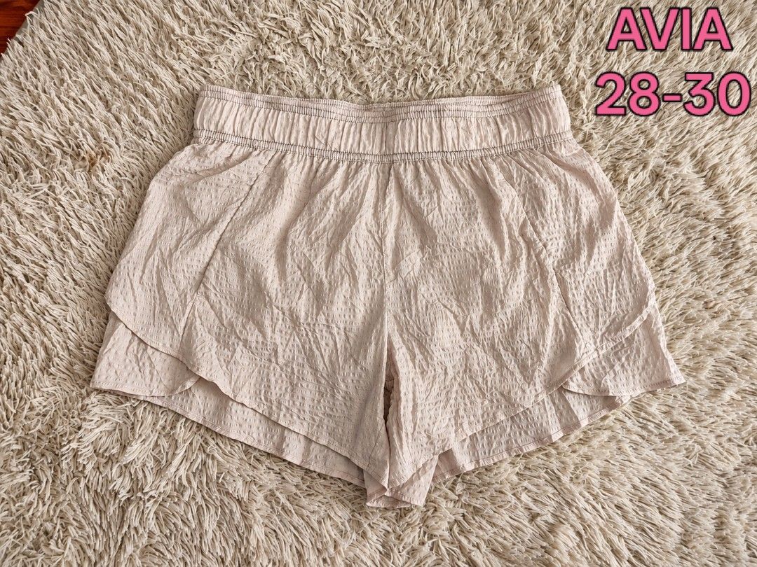 Avia Athletic Shorts (Category: Shorts) located in San Carlos City. Submitted by chinx008 (Listing ID 1467486278, Image 1). Description: - Brand: Avia - Color: Soft Pink - Design: Layered flowy style with all-over textured pattern - Waistband: Elastic with comfortable stretch - Material/Care: Quick-drying, easy to wash - Best for: Workouts, running, and casual wear.