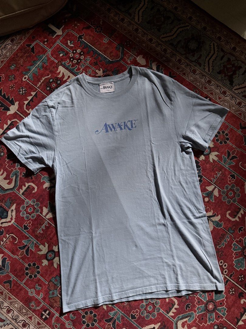 Awake NY Powder blue Tee (Category: Tshirts & Polo Shirts ) located in Manila. Submitted by localstreetwear (Listing ID 1467429183, Image 1). Description: Awake NY Powder Blue Tee 700 Used Large 20wX32L Antipolo City Sf shoulder by the buyer.