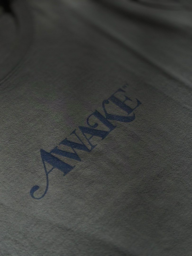 Awake NY Powder blue Tee (Category: Tshirts & Polo Shirts ) located in Manila. Submitted by localstreetwear (Listing ID 1467429183, Image 2). Description: Awake NY Powder Blue Tee 700 Used Large 20wX32L Antipolo City Sf shoulder by the buyer.
