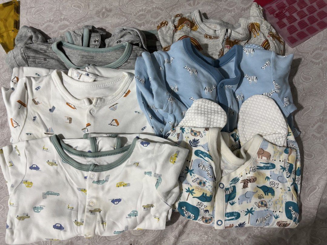 Baby Footed Rompers Sleepsuits Bundle (Category: Babies & Kids Fashion) located in Pasig City. Submitted by 7preloved (Listing ID 1467545852, Image 1). Description: - Bundle of baby boy footed rompers and sleepsuits - Soft and breathable 100% cotton material - Cute assorted prints (safari animals, zebras, cars, sailboats) - Front snap buttons for hassle-free diaper changes - Perfect for comfortable everyday wear.