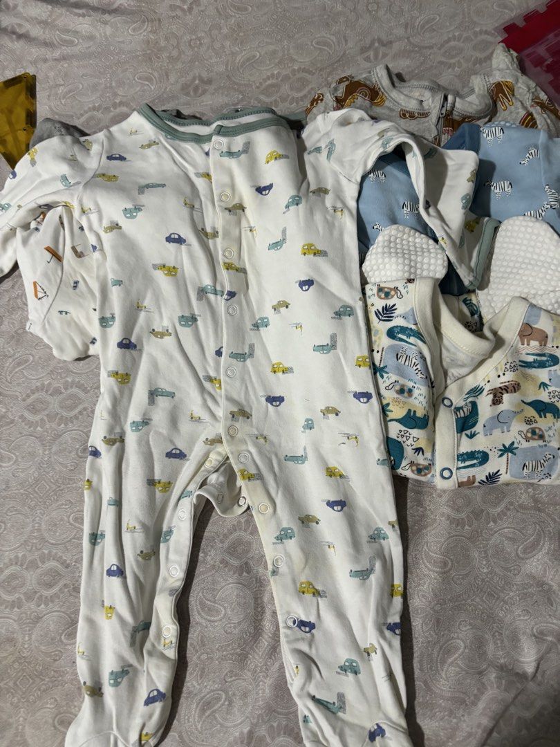 Baby Footed Rompers Sleepsuits Bundle (Category: Babies & Kids Fashion) located in Pasig City. Submitted by 7preloved (Listing ID 1467545852, Image 2). Description: - Bundle of baby boy footed rompers and sleepsuits - Soft and breathable 100% cotton material - Cute assorted prints (safari animals, zebras, cars, sailboats) - Front snap buttons for hassle-free diaper changes - Perfect for comfortable everyday wear.