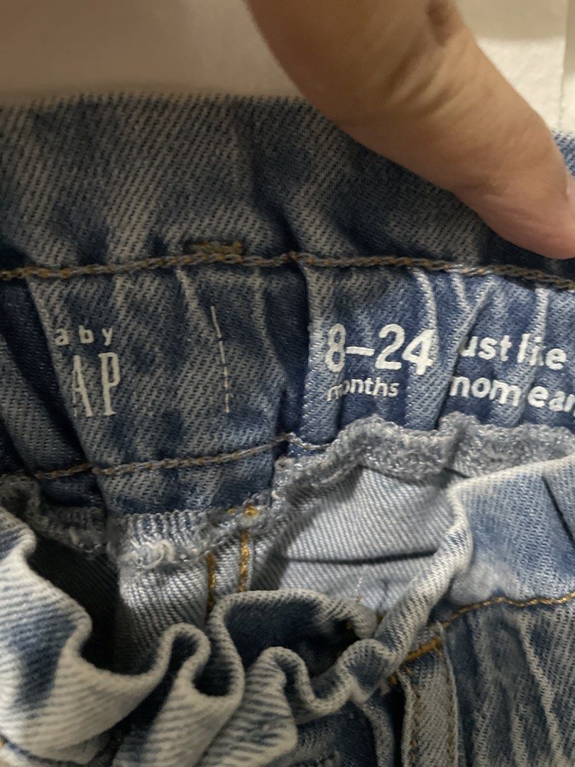 Baby Gap Denim Jeans Size2T (Category: Babies & Kids Fashion) located in San Juan City. Submitted by charrrbr (Listing ID 1467540776, Image 2). Description: - Brand: Baby Gap - Size: 18-24 months - Color/Wash: Light wash denim - Waistband: Elastic back with a cute ruffled top edge - Closure: Front button with belt loops - Hem: Trendy raw fringe at the ankles - Condition: Excellent, ready to wear.