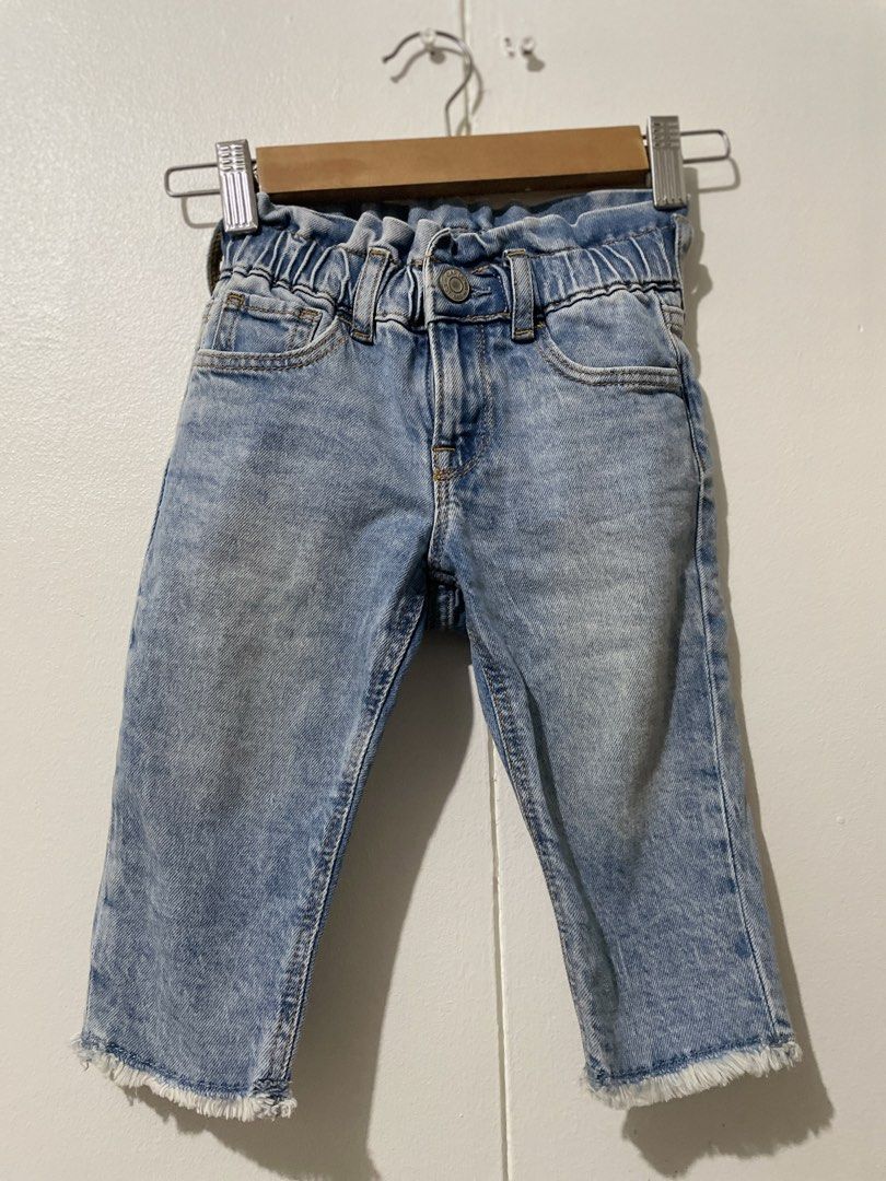 Baby Gap Denim Jeans Size2T (Category: Babies & Kids Fashion) located in San Juan City. Submitted by charrrbr (Listing ID 1467540776, Image 1). Description: - Brand: Baby Gap - Size: 18-24 months - Color/Wash: Light wash denim - Waistband: Elastic back with a cute ruffled top edge - Closure: Front button with belt loops - Hem: Trendy raw fringe at the ankles - Condition: Excellent, ready to wear.