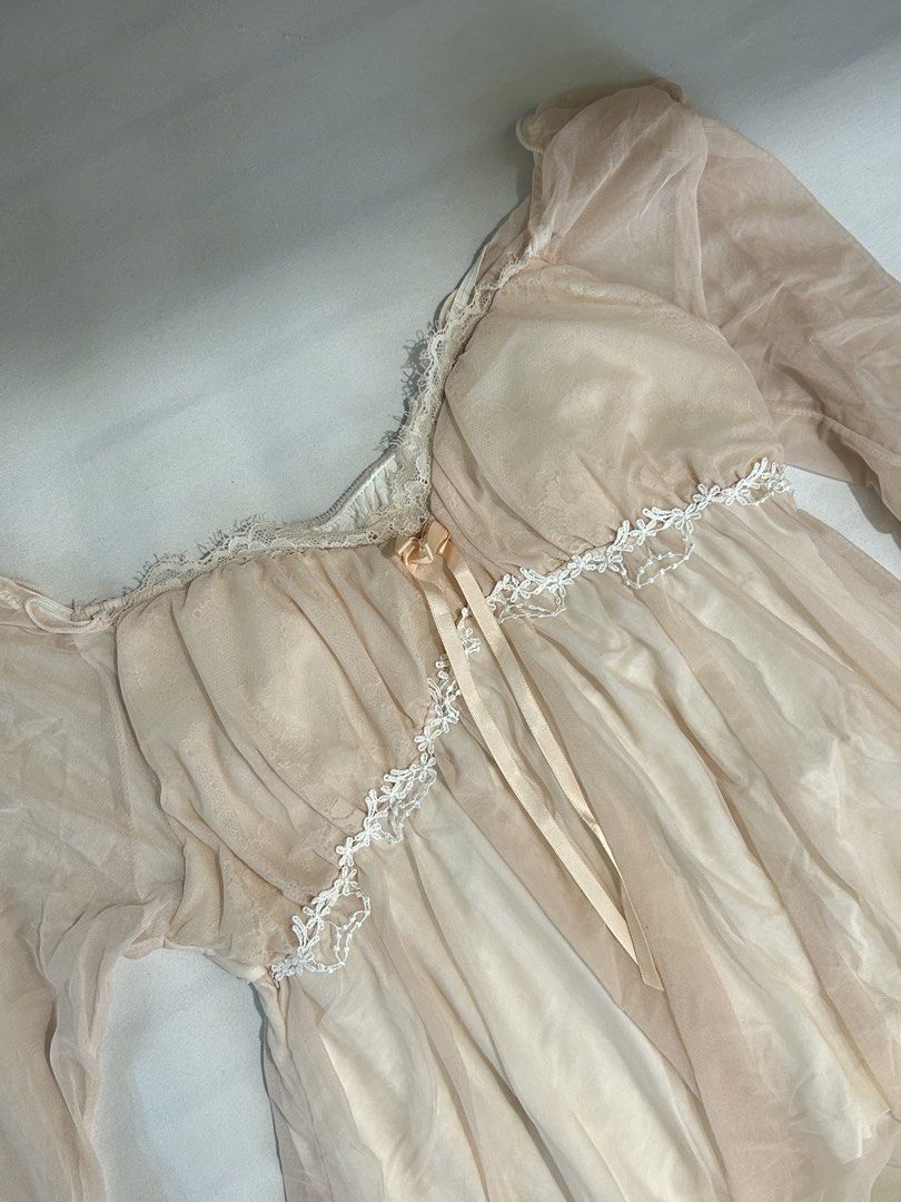 babydoll mesh padded top (Category: Blouses) located in Manila. Submitted by nikkishops (Listing ID 1467507658, Image 2). Description: ࣪˖⋆𓍢ִ໋soft orange-y pink mesh, lightweight and presko fabric layers ࣪˖⋆𓍢ִ໋ white floral lace trim with a satin bow at the bust ࣪˖⋆𓍢ִ໋ long sheer sleeves with charming ruffled cuffs ࣪˖⋆𓍢ִ໋gathered empire waist style for a flattering silhouette ‼ minor flaw: small rip sa may shoulder side (see 3rd pic), barely n