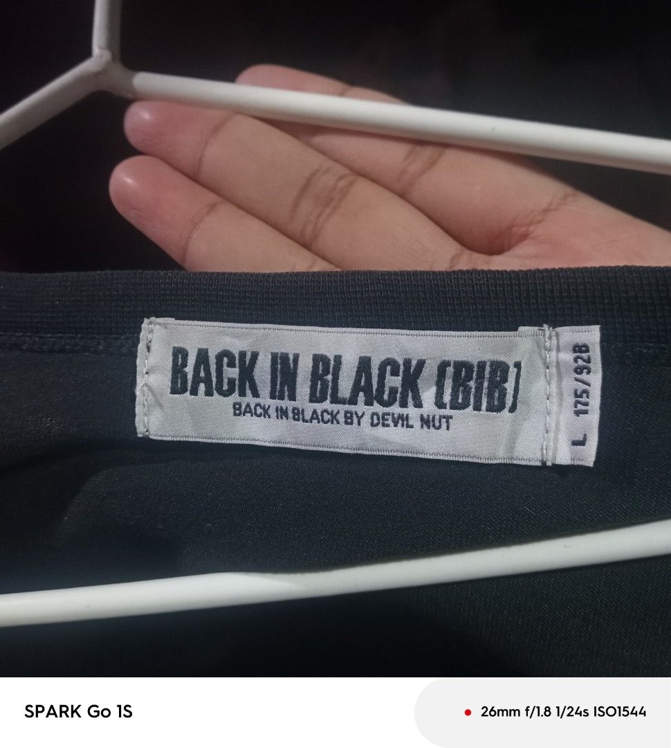 🔥💀BACKINBLACK BY DEVIL NUT💀🔥 (Category: Tshirts & Polo Shirts ) located in Taguig. Submitted by anadomissy93874 (Listing ID 1467505305, Image 2). Description: 🔥 FOR SALE 🔥 💀 BACK IN BLACK by Devil Nut 💀 🎸 Skull Guitar Graphic Tee 🎸 📏 Size: L on tag (175/92B) 👕 Fits: M to L 🎨 Color: Black ✨ Condition: 9/10 🚫 No pinhole, No stain 💯 Print buo pa! 🧵 Double stitch - makapal tela matibay! 🎯 Perfect pang: ✔️ Streetwear ✔️ Porma ✔️ Gig /