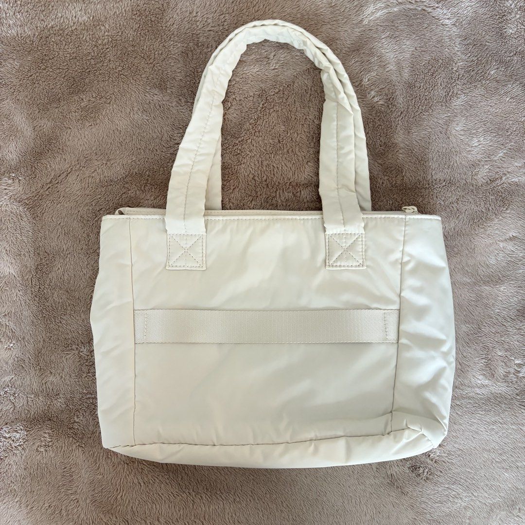 Bagsmart Puffy Tote (Category: Shoulder Bags) located in San Juan City. Submitted by _ands_ (Listing ID 1467464929, Image 2). Description: - Size: Small - Color: Beige - No flaws; good as new .