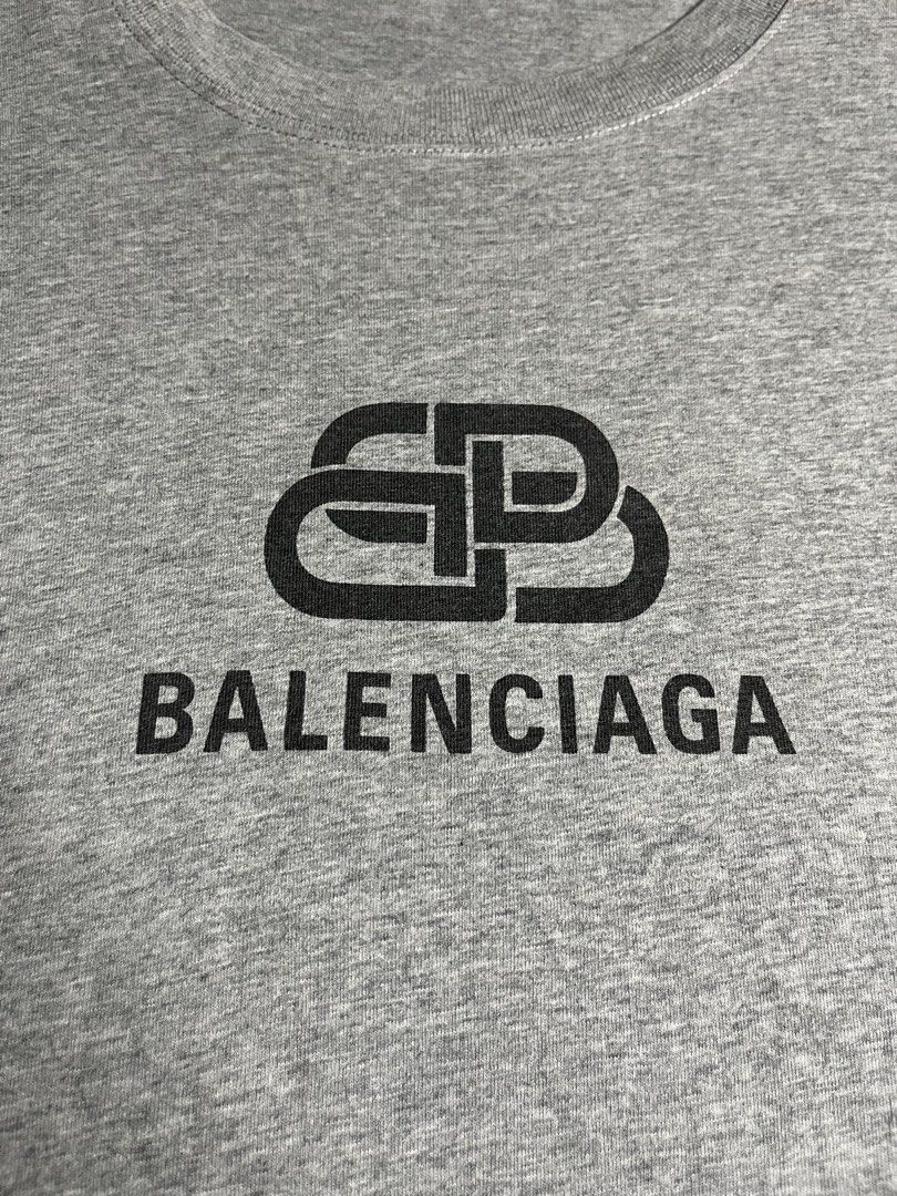 Balenciaga BB Logo Grey Tee (Category: Shirts) located in Manila. Submitted by lj_thrifter (Listing ID 1467378086, Image 3). Description: Balenciaga •Size Large •Dimes 23x28.5 •As new •Color rate 9.5/10 •Issue: cut tag •Can you check the details before your check out.