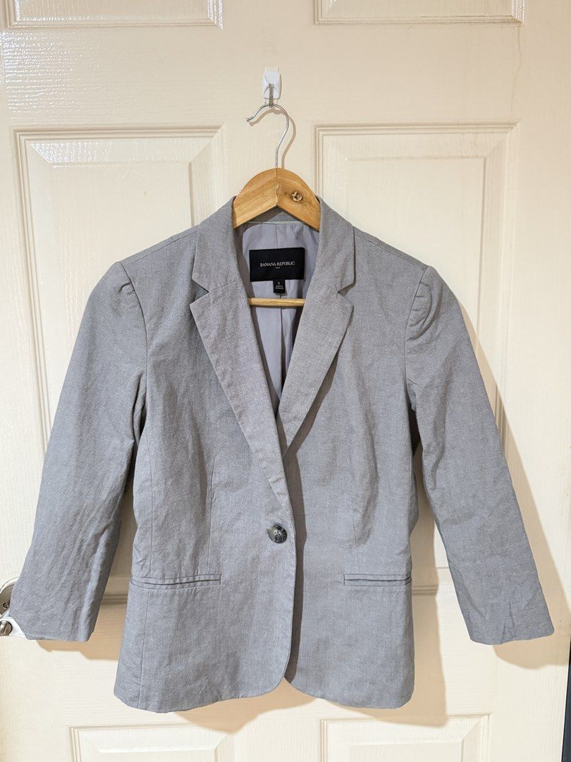 Banana Republic Grey Blazer Size 2 (Category: Coats, Jackets and Outerwear) located in Manila. Submitted by ktyyycloset (Listing ID 1467446049, Image 1). Description: - Brand: Banana Republic - Size: 2 - Color: Grey - Closure: Classic single-button front - Details: Structured lapels and two front welt pockets - Lining: Fully lined interior - Origin: Made in Indonesia - Style: Professional and versatile, ideal for work or smart casual outfits.