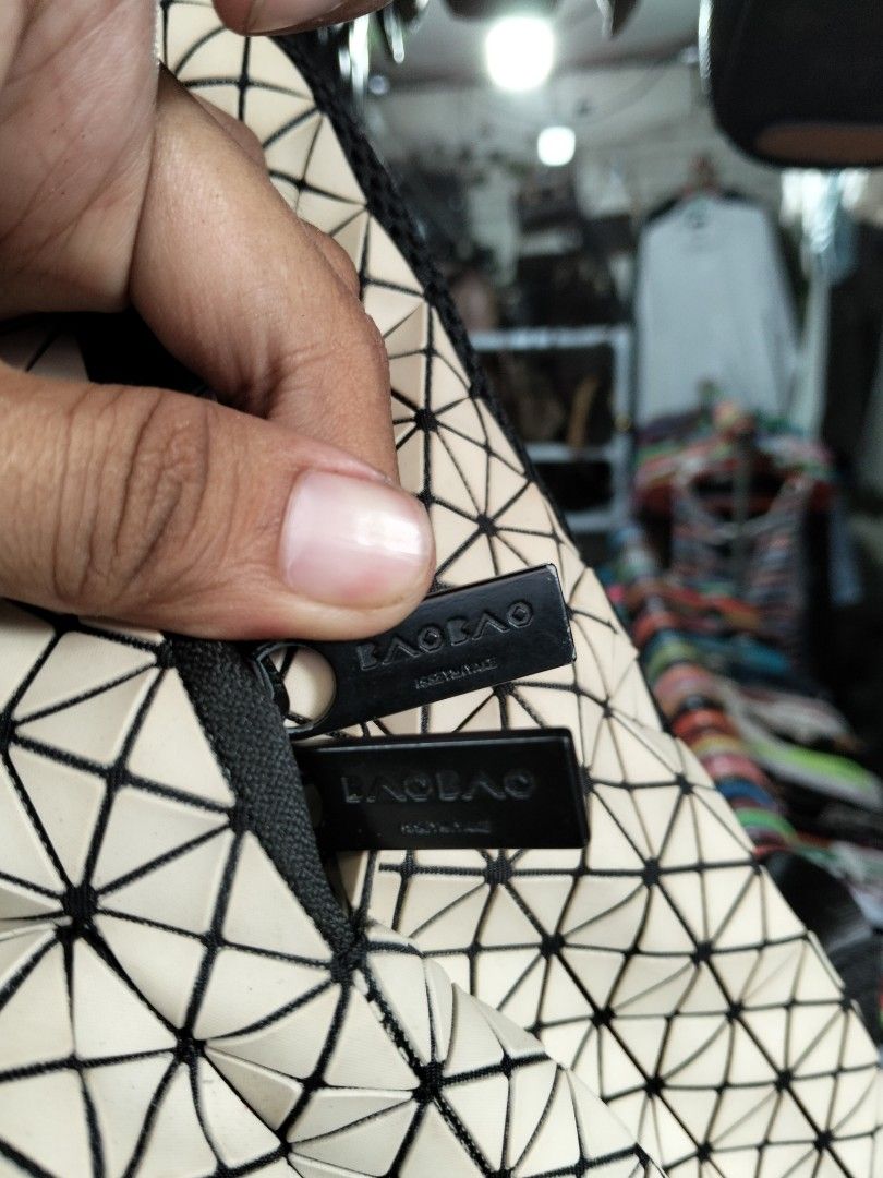 Baobao Issey Miyake backpack (Category: Backpacks) located in Nabua. Submitted by tendollardeals (Listing ID 1467452640, Image 3). Description: excellent condition need wash.