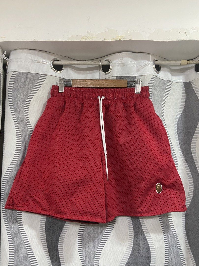 Bape mesh short (Category: Shorts) located in Manila. Submitted by oldso.ulfinds (Listing ID 1467599485, Image 1). Description: Bape mesh short red Good condition Dimes: W:30 L:16 Colorrate:9.5/10 No tags .