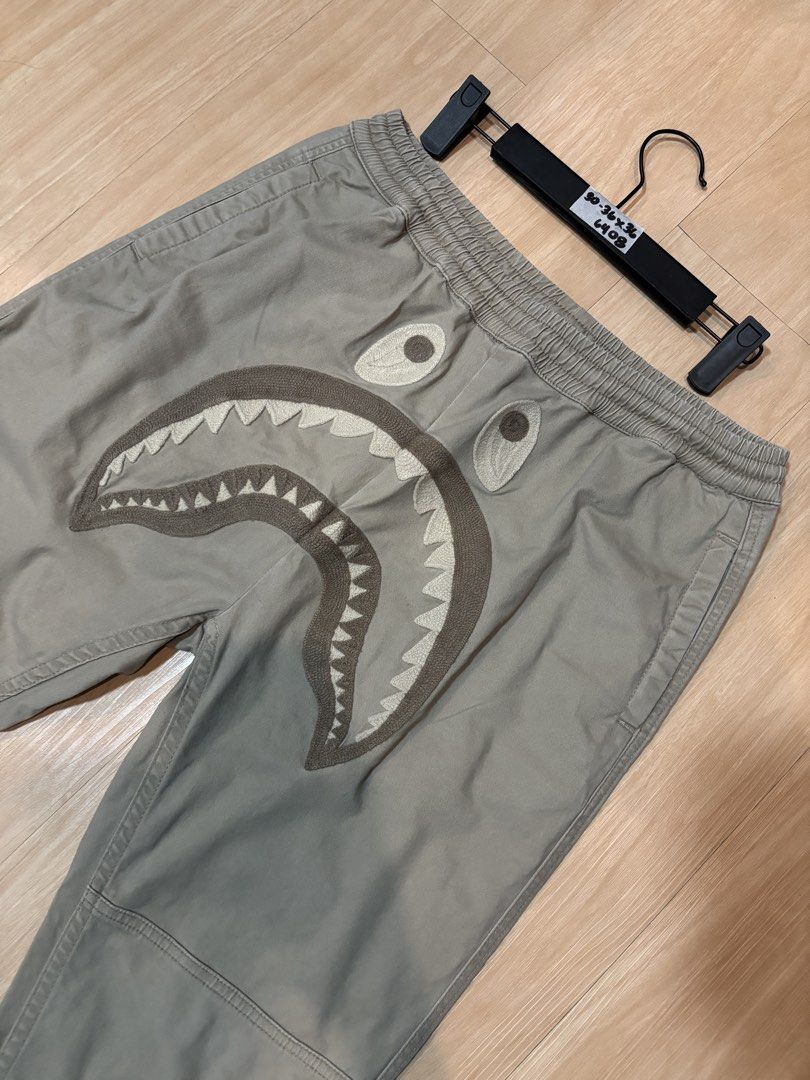 Bape Shark Jogger Pants (Category: Joggers) located in Quezon City. Submitted by callelistothriftshop (Listing ID 1467488764, Image 2). Description: 🔥CL - 6408 | Bape Shark Jogger Pants 🔥 💸 PRICE: ₱ 1380 + Shipping Fee ➡️ DIMENSION: 30-36”W x 36”L ➡️ SIZE ON TAG: Medium ➡️ COLOR: Beige ✨ CONDITION: Very Good Used Condition ‼️ ISSUE: (Please manage expectations)Needs extra wash.
