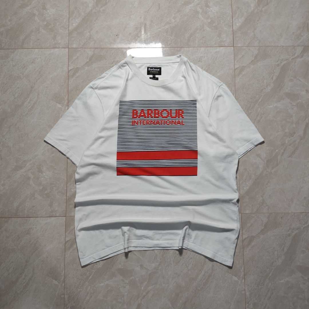 Barbour International White T-shirts (Category: Tshirts & Polo Shirts ) located in Tayabas. Submitted by streetdept.ph (Listing ID 1467445910, Image 1). Description: Barbour International White T-shirts Measurements (inches): Width: 23 Length: 29 Size: XXL on tag fits XL Good condition Flaw: minor stain.