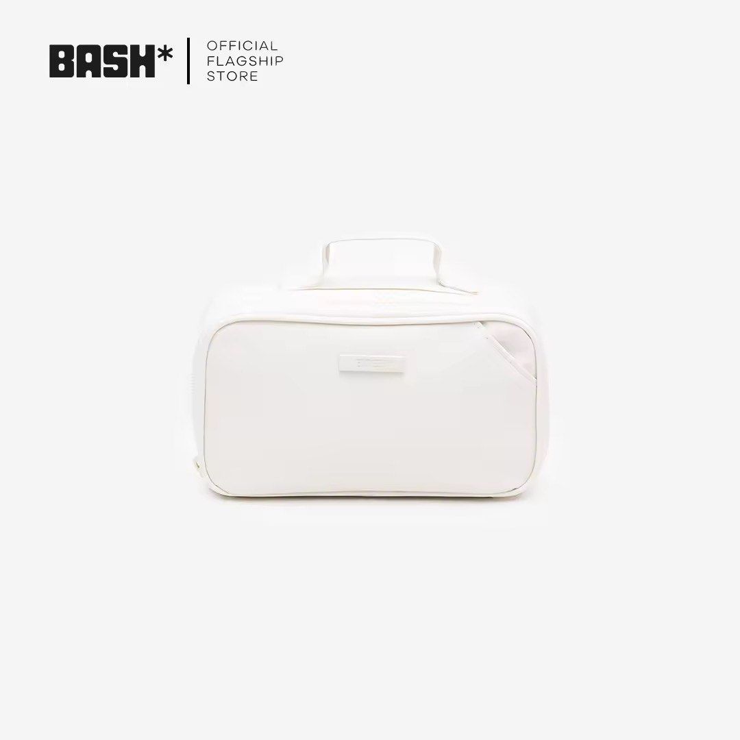 BASH PORT Essentials Collection Toiletry Bag (Category: Purses & Pouches) located in Paranaque City. Submitted by lizzymutia (Listing ID 1467372383, Image 1). Description: - Brand/Collection: BASH PORT Essentials - Price: Affordable & High Quality - Colors Available: Bone/White - Dimensions: Compact 18cm x 10cm x 5cm size - Material: Durable, water-resistant nylon - Features: Multiple interior mesh pockets and elastic loops for easy organization 