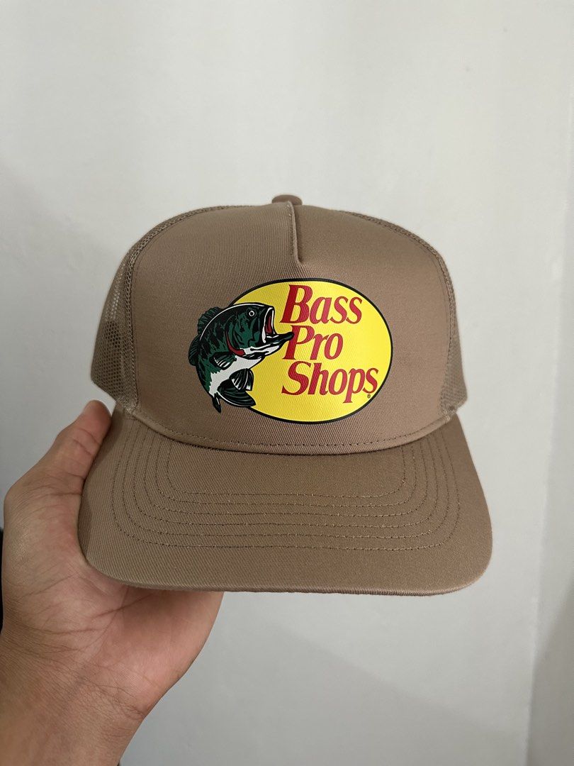Bass Pro Shops Trucker Hat Multiple Colors Available (Category: Caps & Hats) located in Quezon City. Submitted by crisfortyshop (Listing ID 1467531717, Image 1). Description: Authentic Bass Pro Shops trucker hat available in 5 colors. Features a structured front, mesh back, snapback closure, and the iconic fish patch logo. Perfect for outdoors and casual wear..