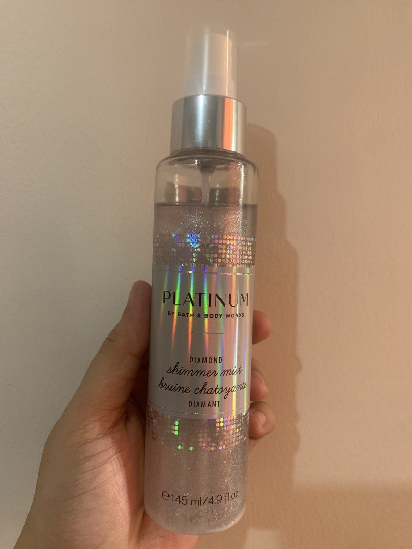 Bath & Body Works Platinum Diamond Shimmer Mist (Category: Fragrance & Deodorants) located in General Trias. Submitted by clairexlaundromat (Listing ID 1467385171, Image 1). Description: - Product: Bath & Body Works Diamond Shimmer Mist - Scent: Platinum - Size: 145 ml / 4.9 fl oz - Condition: Brand new, full bottle, unused - Features: Stunning holographic label design, infused with shimmer - Storage: Properly stored away from direct sunlight - I