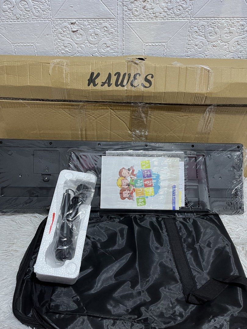 BD601 Piano keyboard with stand Brandnew (Category: Musical Instruments) located in Manila. Submitted by joharahmauna_18 (Listing ID 1463359076, Image 3). Description: KAWES BD601 Piano 61 Keys Digital Electric Piano Keyboard Portable Electronic Keyboard with stand and bag complete accessories . ✅ Brandnew w box no issue Inclusions: Box, Stand , Bag Microphone, Audio-line ,Charging Cable, Music stand, Lyric/ Sheet, Instruction, Keyboard Sticker L