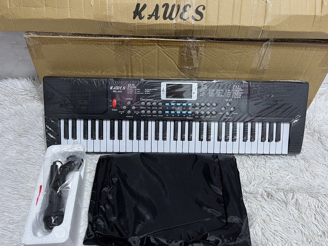 BD601 Piano keyboard with stand Brandnew (Category: Musical Instruments) located in Manila. Submitted by joharahmauna_18 (Listing ID 1463359076, Image 1). Description: KAWES BD601 Piano 61 Keys Digital Electric Piano Keyboard Portable Electronic Keyboard with stand and bag complete accessories . ✅ Brandnew w box no issue Inclusions: Box, Stand , Bag Microphone, Audio-line ,Charging Cable, Music stand, Lyric/ Sheet, Instruction, Keyboard Sticker L