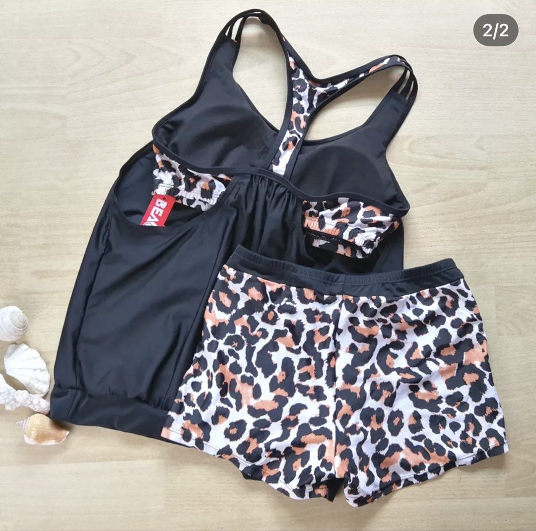 BEA&COS Leopard Print Tankini Swimwear Set Medium (Category: Bikinis & Swimsuits) located in Bulacan. Submitted by peach1025 (Listing ID 1467366191, Image 2). Description: - Brand new with tags attached, never worn - Size: Medium - Material: 85% polyester, 15% spandex - Black tankini top with trendy leopard print racerback straps - Includes matching leopard print board shorts - Perfect for your next beach getaway or pool day.