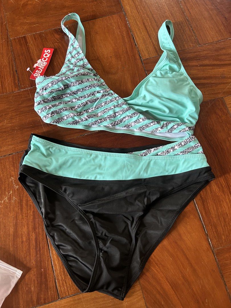 BEA&COS Two-Piece Bikini Set Mint Black Size M (Category: Bikinis & Swimsuits) located in Bulacan. Submitted by peach1025 (Listing ID 1467365552, Image 1). Description: - Brand: BEA&COS - Condition: Brand new with tags (Red brand hang tag attached) - Size: M - Color/Pattern: Mint green and black with striped detailing on top and waistband - Style: Supportive straps and high-waisted bottoms.