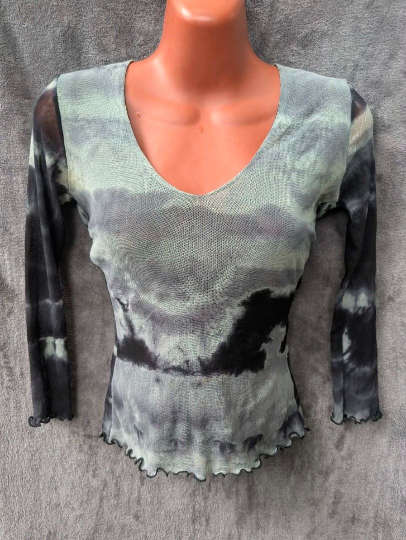 Bebe longsleeves itted grey black small (Category: Others Tops) located in San Carlos. Submitted by khaisser07 (Listing ID 1467387743, Image 1). Description: Bebe y2k, size small Price 1200 shipped .