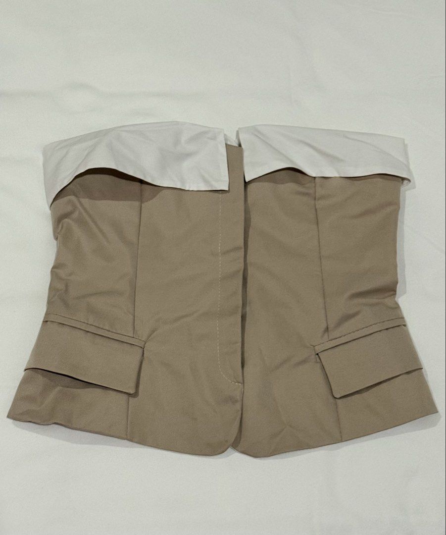Beige & White Button Down Tube Top (Category: Sleeveless) located in Pasig City. Submitted by mxvxt (Listing ID 1467453962, Image 1). Description: 〰 brand new, never been used 〰 fits XS-S frame 〰 cute & dainty european summer top! 〰 rfs: decluttering .