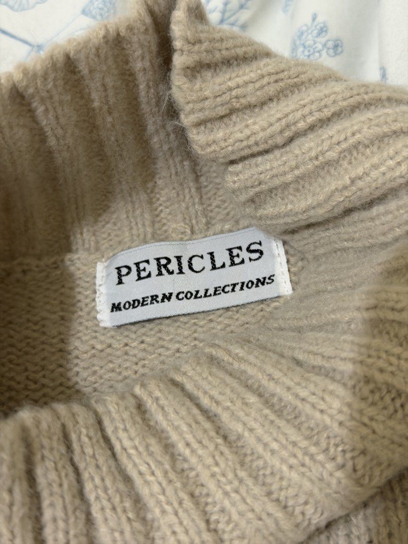 Beige sweater (Category: Coats, Jackets and Outerwear) located in Makati City. Submitted by declutterwithella (Listing ID 1467478733, Image 2). Description: No brand Best fits XS-Small Flaw: Not sure if stain or just thread (see pic) Location: Bangkal, Makati.