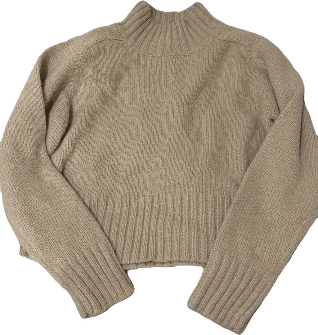 Beige sweater (Category: Coats, Jackets and Outerwear) located in Makati City. Submitted by declutterwithella (Listing ID 1467478733, Image 1). Description: No brand Best fits XS-Small Flaw: Not sure if stain or just thread (see pic) Location: Bangkal, Makati.