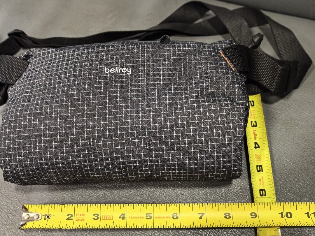 Bellroy Lite venture Sling Bag (Category: Sling Bags) located in Cagayan de Oro. Submitted by pootx (Listing ID 1467517652, Image 2). Description: - Authentic Bellroy Lite venture Series Sling Bag in stylish grid pattern - Ultra-lightweight and durable ripstop material, perfect for daily use - Compact size measuring approx. 9 inches across - Secure zippered main compartment featuring interior organization pockets and a convenient key leash - Adju