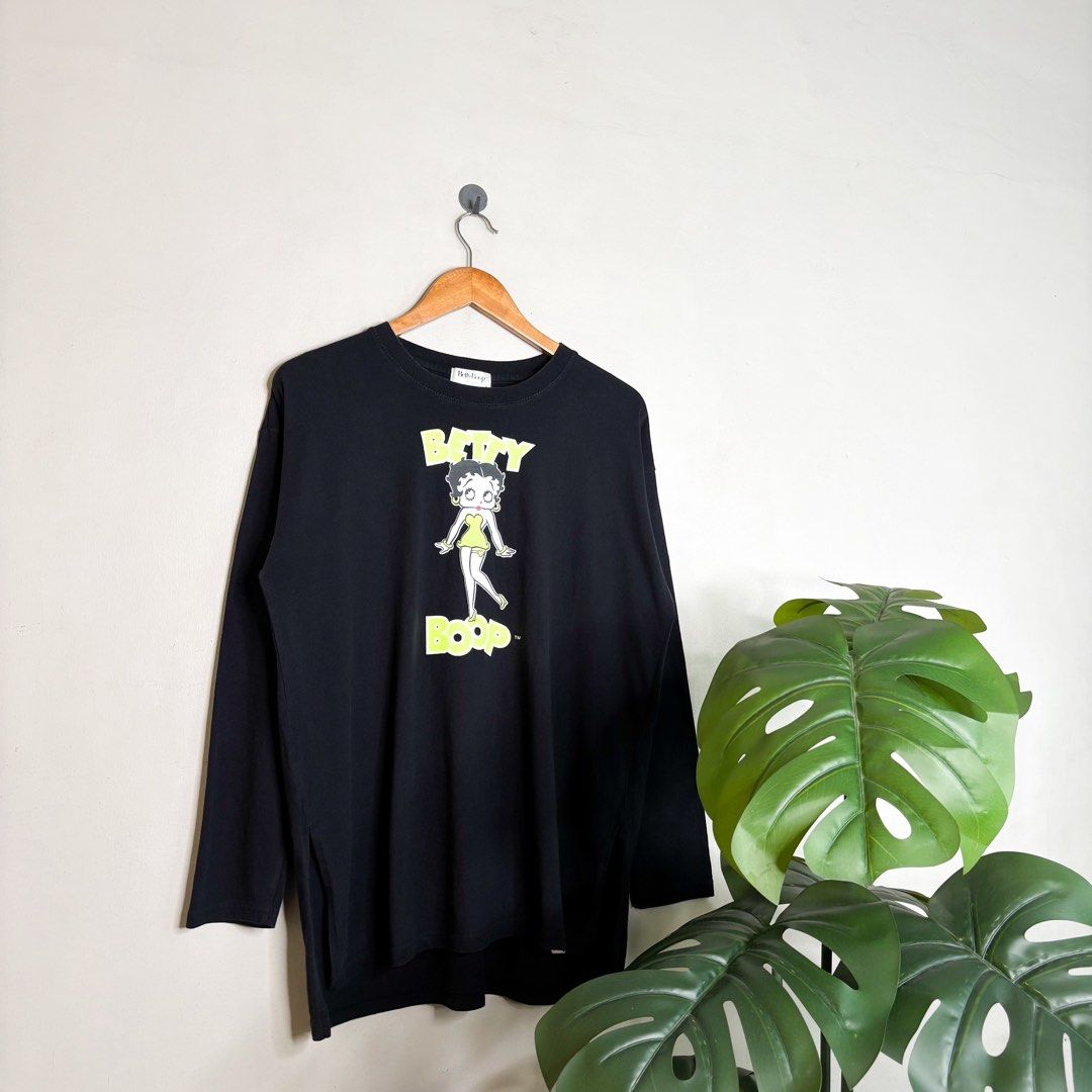 Betty Boop | Longsleeve Tee. (Category: Tshirts & Polo Shirts ) located in Manila. Submitted by bypiecesandstories (Listing ID 1467404878, Image 1). Description: Betty Boop | Longsleeve Tee. 649 PHP 🧡 Perfect Condition Can Fit — Medium to X Large Dimensions — W 23" L 30" A comfy long sleeve tee featuring a Betty Boop graphic. An easy to style graphic top with a fun vintage inspired feel. Wear it as a standout casual layer or pair it with denim f