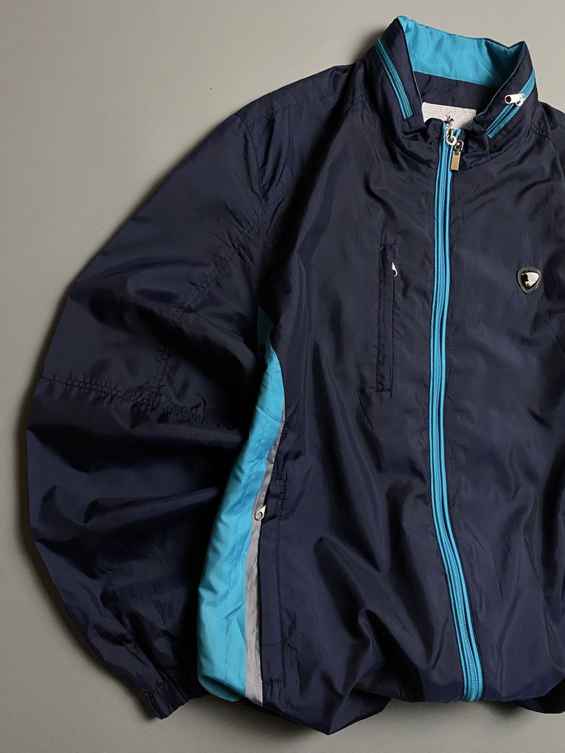 Beverly Hills Windbreaker Jacket with Packable Hood (Category: Coats, Jackets and Outerwear) located in Cebu City. Submitted by covenanthrifts (Listing ID 1467374037, Image 3). Description: Very Good Condition Color Rate: 9/10 Size on tag : 95 (Fit to Medium) Issue: Small Hole (See Last Photo).