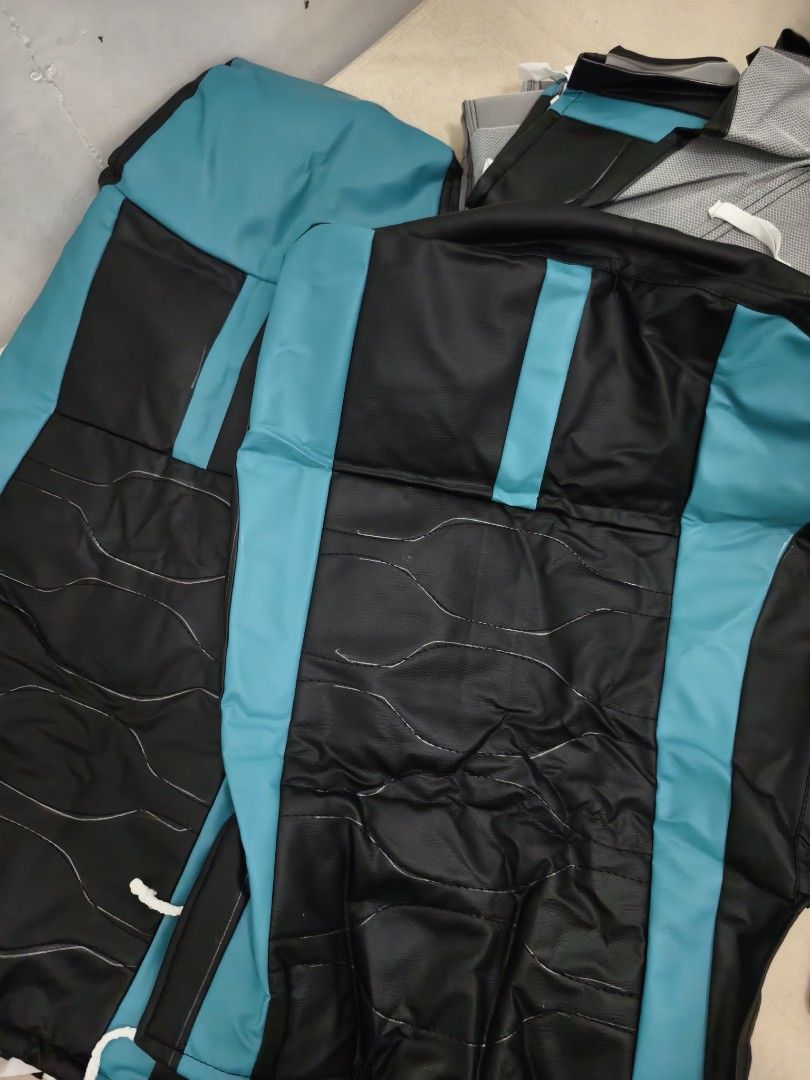 Black and Turquoise Car Seat Covers Set (Category: Car Seats) located in Angeles City. Submitted by measaliman02351 (Listing ID 1467430026, Image 3). Description: Brand new black and turquoise faux leather car seat covers with a stylish center stripe and wavy stitch design. Complete set for both front and rear seats, ready for easy installation. CANTER TRUCK CAR SEAT COVER SET .