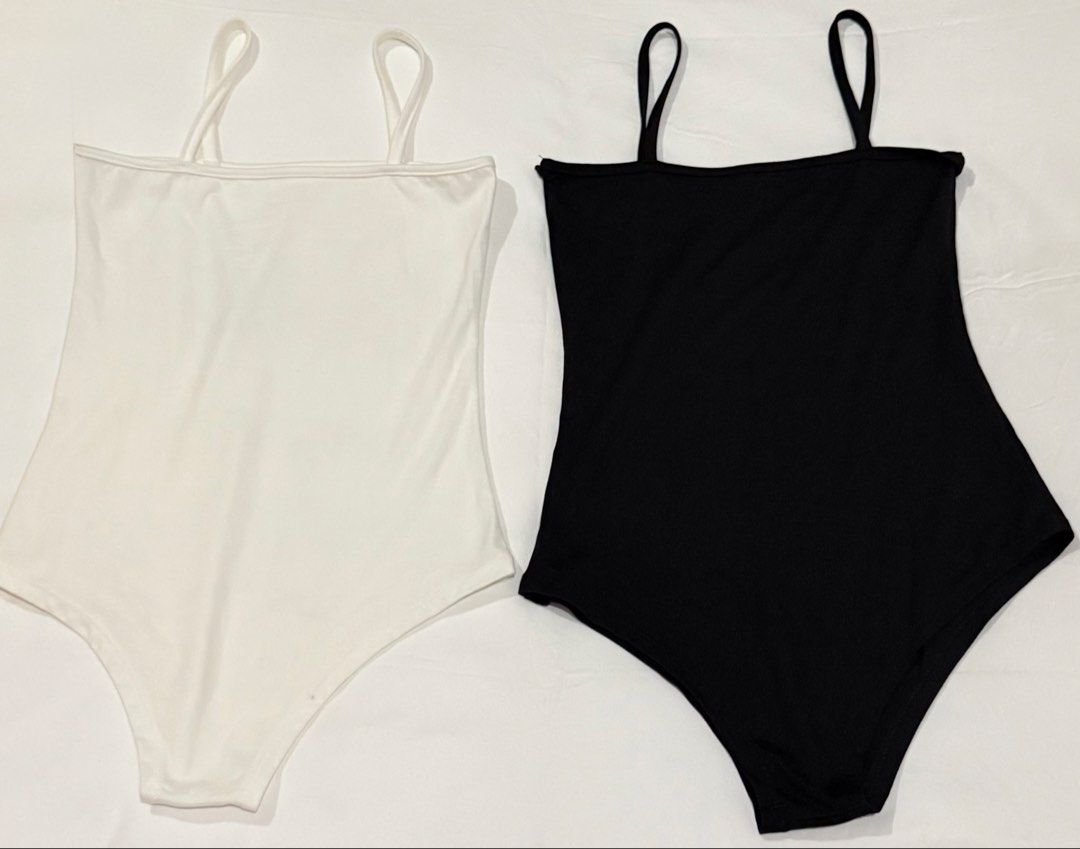 Black and White Camisole Bodysuits (Category: Sleeveless) located in Pasig City. Submitted by mxvxt (Listing ID 1467466172, Image 1). Description: 〰 in good condition 〰 fits XS-S frame 〰 lightweight and breathable fabric 〰 200 for 1, 350 for 2 〰 rfs: decluttering .