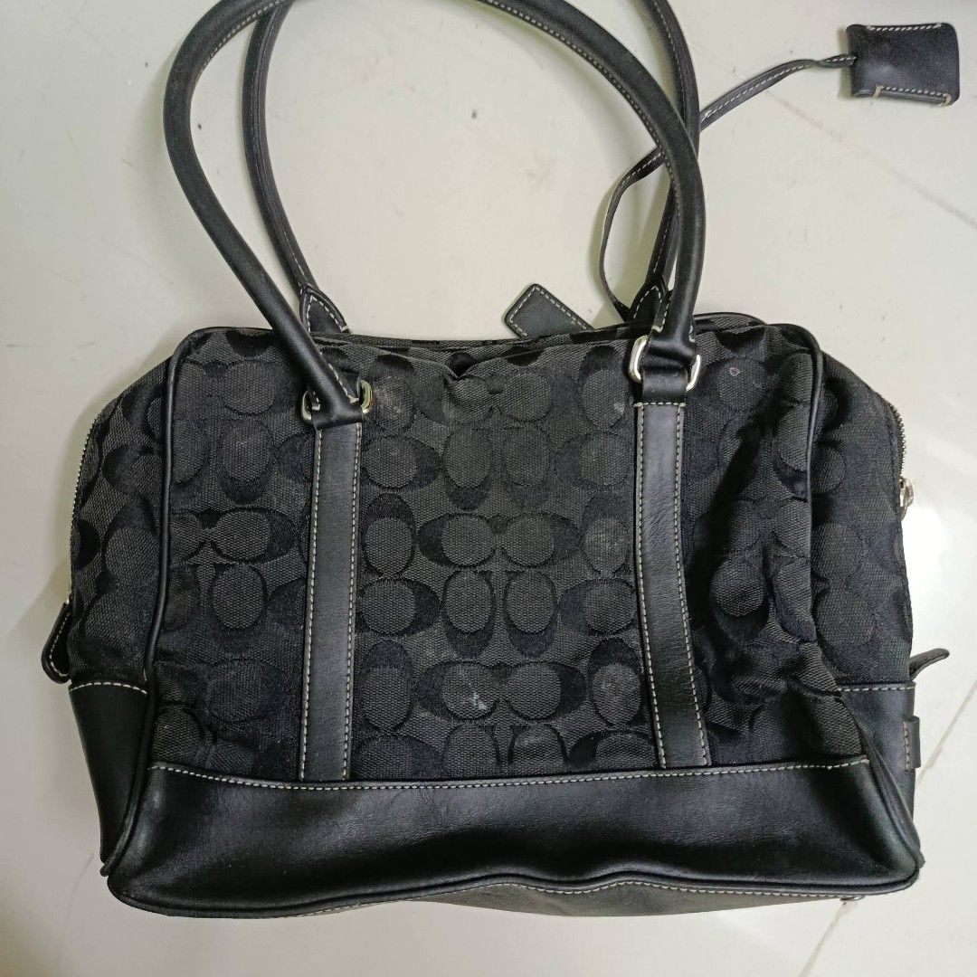 Black canvas coach handbag (Category: Luxury Bags & Wallets) located in Manila. Submitted by daphnefinds1 (Listing ID 1467559160, Image 1). Description: may maliit na rubs pero d kita masyado mine as is nalang no hangtag mejo may gasgaz sa leather malinis loob fix price loc tondo manila mine now pay now.