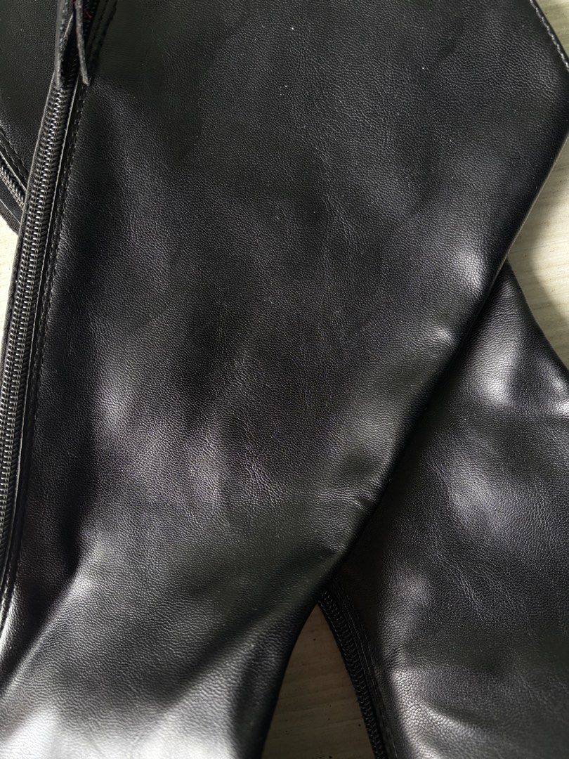 Black knee-high chunky platform boots with side zipper (Category: Boots) located in Caloocan City. Submitted by larenpreloved (Listing ID 1467424579, Image 2). Description: - Style: Knee-high boots with chunky platform soles and rounded toe - Material: Faux leather - Details: Full-length side zipper with pull tab and front center seam - Perfect for effortless edgy outfits RFS: decluttering Used twice .