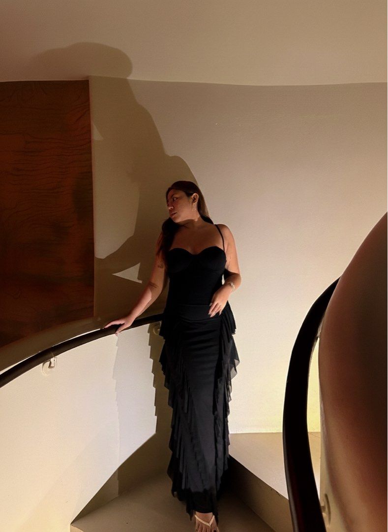 Black Maxi Dress with Ruffle Details (Category: Dresses) located in Manila. Submitted by xoriribautista06 (Listing ID 1467446069, Image 1). Description: Color: Black Style: Floor-length long dress with layered ruffles on both sides Condition: Worn once for an event Perfect for: Parties, formal events, or date nights Got it for 1700, selling for 500.