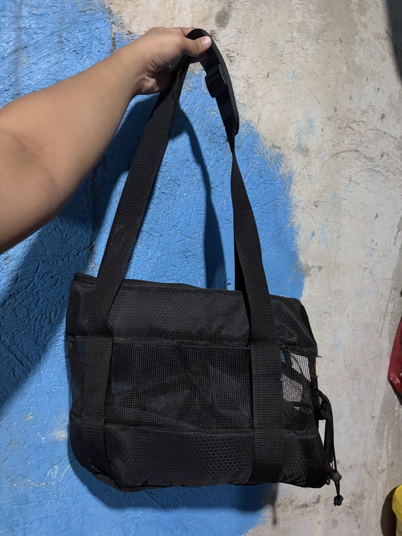 Black mesh shoulder bag with honeycomb pattern (Category: Shoulder Bags) located in Santa Rosa. Submitted by altheajaner01 (Listing ID 1467462234, Image 1). Description: - Color: Black - Material: Honeycomb textured fabric with a middle mesh panel - Strap: Adjustable with a secure plastic buckle closure - Compartment: Deep main compartment for your daily essentials - Design: Simple utility style, lightweight, and very practical for casual outings