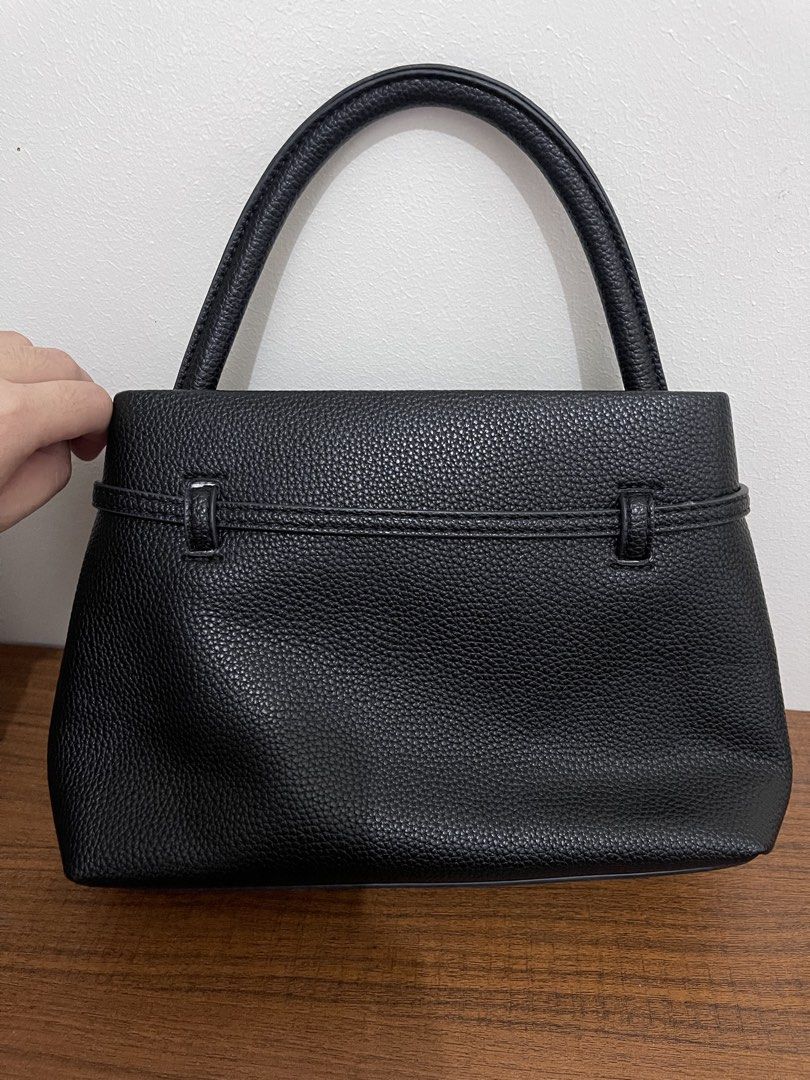 Black Pebbled Leather Top Handle Handbag (Category: Tote Bags) located in Manila. Submitted by prelovedcuties21 (Listing ID 1467443930, Image 2). Description: preloved!! - no strap - no box included rfs: not using anymore, naka tambak nalang.