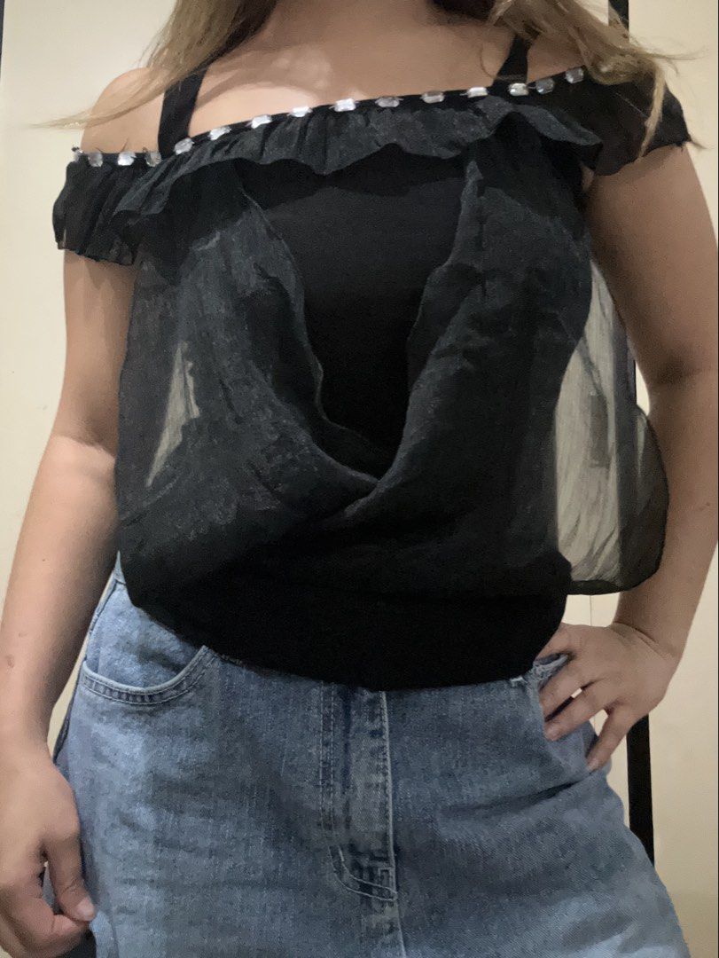 Black Ruffle Off Shoulder Top with Rhinestones (Category: Sleeveless) located in Cavite. Submitted by lj.collection (Listing ID 1467409519, Image 1). Description: ✦ Best fits xs-s ✦ Got this on an ig shop for ₱280 ✦ Never wore this ✦ Check pictures for defect! ✦ Slightly negotiable ✦ MOP: Gcash, Maya, Maribank, BDO ✦ MOD: J&T, Lalamove, Grab, Angkas.