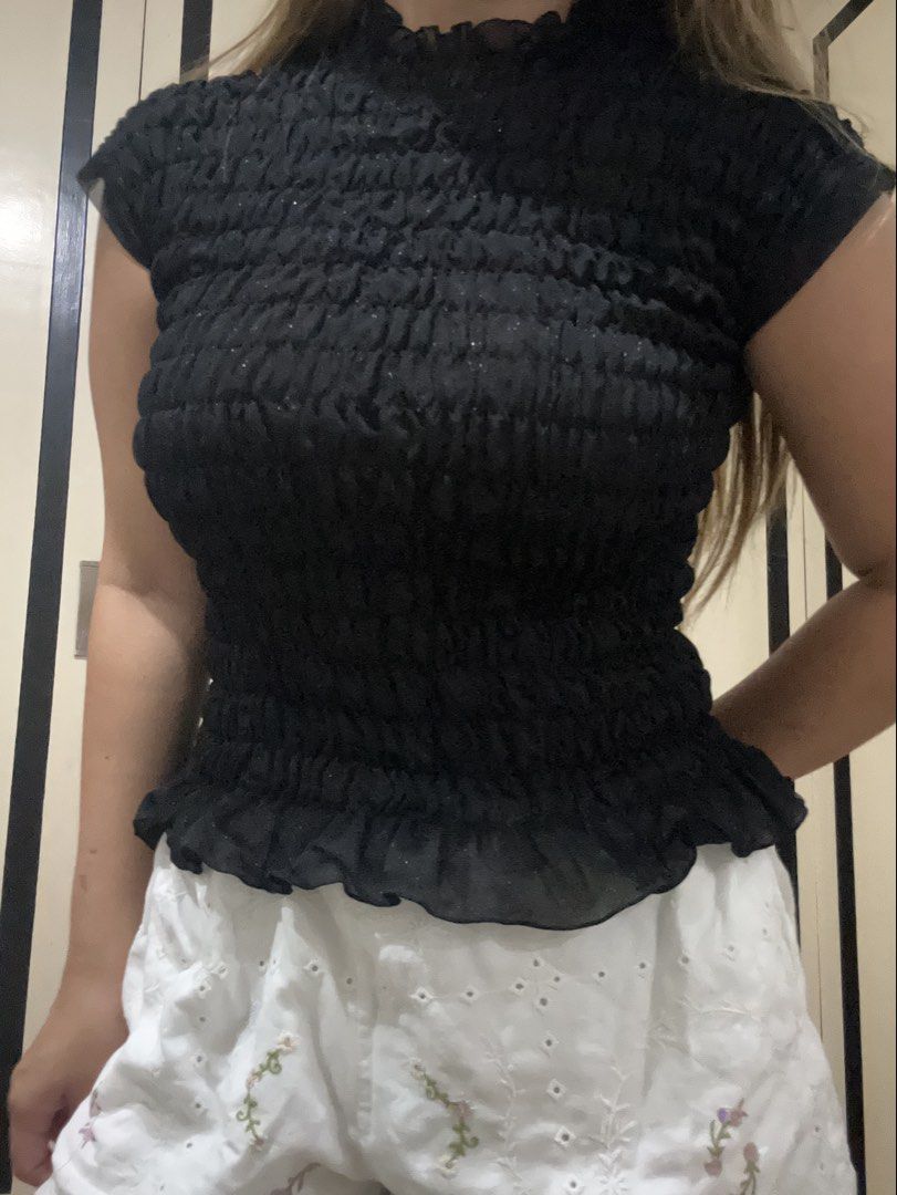 Black Smocked Mock Neck Mesh Top (Category: Sleeveless) located in Cavite. Submitted by lj.collection (Listing ID 1467411166, Image 2). Description: ✦ Best fits xs-s ✦ Got this on an ig shop for ₱220 ✦ worn once, no flaws ✦ has a glitter effect ✦ MOP: Gcash, Maya, Maribank, BDO ✦ MOD: J&T, Lalamove, Grab, Angkas.