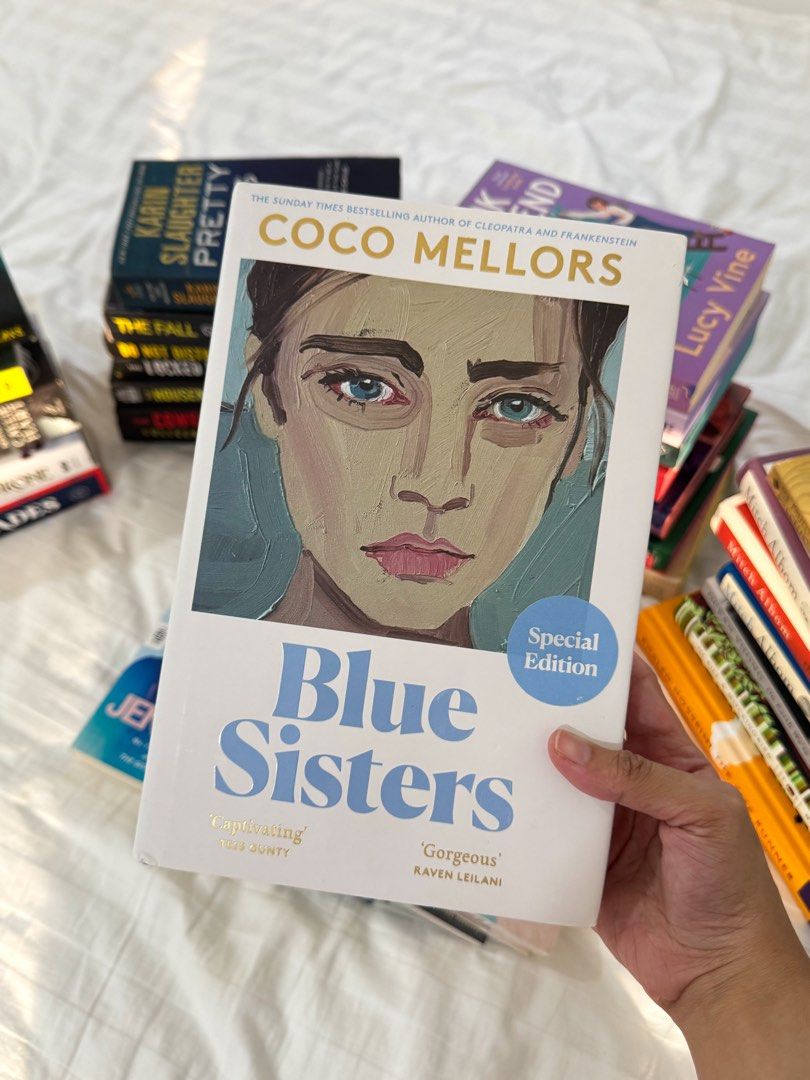 Blue Sisters by Coco Mellors (Special Edition) (Category: Storybooks) located in San Jose. Submitted by lizbuxbaum (Listing ID 1467512314, Image 1). Description: - Format: HB - Condi: BN w/ minor issue on dustjacket (Stenciled; Special Ed) - DM to see condition MOP: Gcash, Maya MOD: JnT, LBC (door to door or COP).