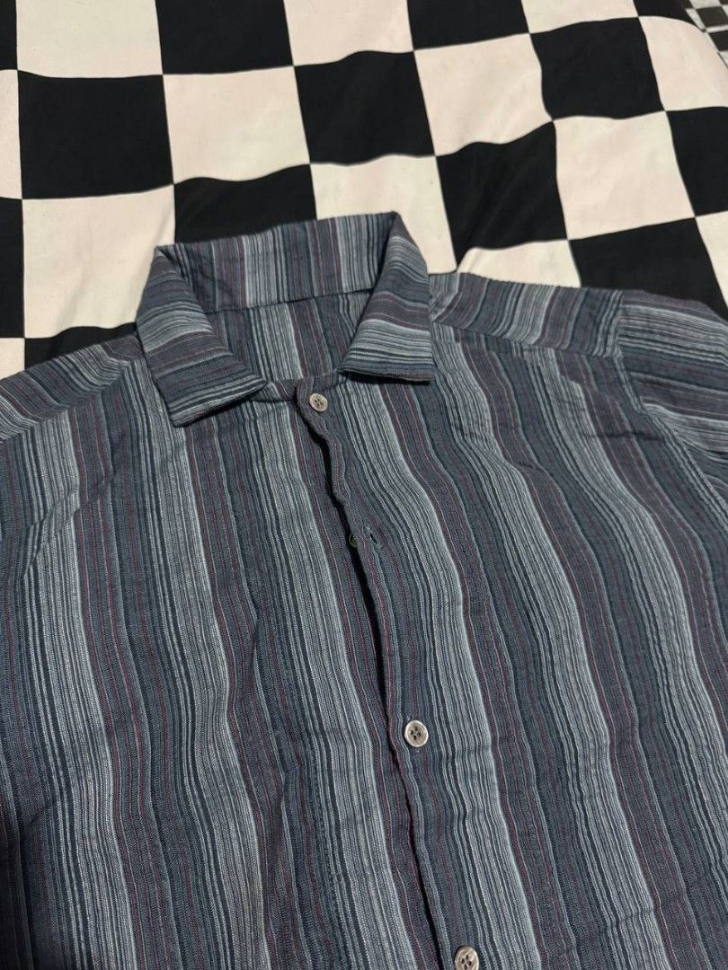 Blue Striped Short Sleeve Polo (Category: Tshirts & Polo Shirts ) located in Binan City. Submitted by kaiz3nnnn_ (Listing ID 1467479344, Image 2). Description: - Short sleeve button down - Pattern: Blue tones with vertical stripes - Mode of Payment: Gcash .