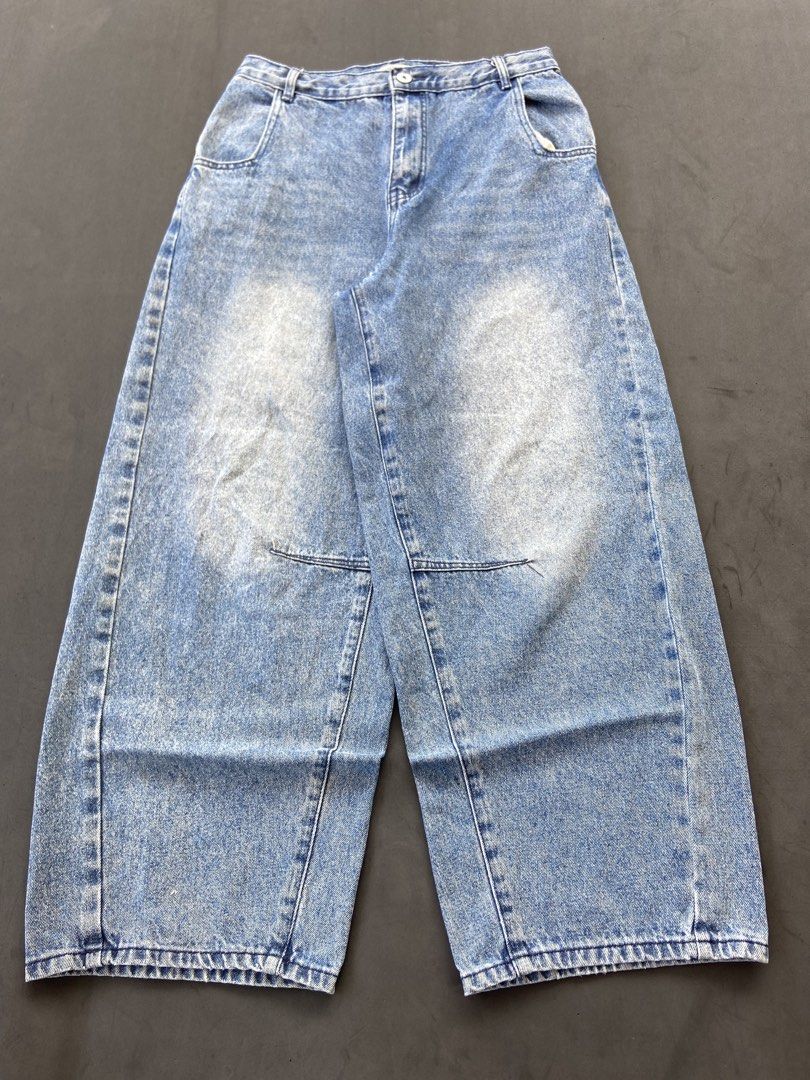 Blue washed barrel Jeans Baggy Denim (Category: Jeans) located in Davao. Submitted by krixianhandpicked (Listing ID 1467447021, Image 3). Description: Baggy barrel pants ( Hard thick ) Waist 32 Thigh 14.5 Length 40 Leg hole 10.3 - Trendy acid wash denim with a relaxed wide-leg baggy cut - Features light fading on knees and thighs for a worn-in look - Classic 5-pocket design with stylish contrast stitching - Secure button fly closure and straight 