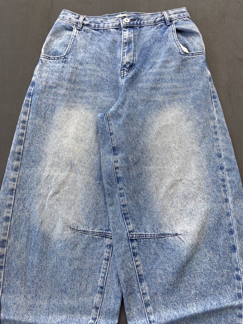 Blue washed barrel Jeans Baggy Denim (Category: Jeans) located in Davao. Submitted by krixianhandpicked (Listing ID 1467447021, Image 2). Description: Baggy barrel pants ( Hard thick ) Waist 32 Thigh 14.5 Length 40 Leg hole 10.3 - Trendy acid wash denim with a relaxed wide-leg baggy cut - Features light fading on knees and thighs for a worn-in look - Classic 5-pocket design with stylish contrast stitching - Secure button fly closure and straight 