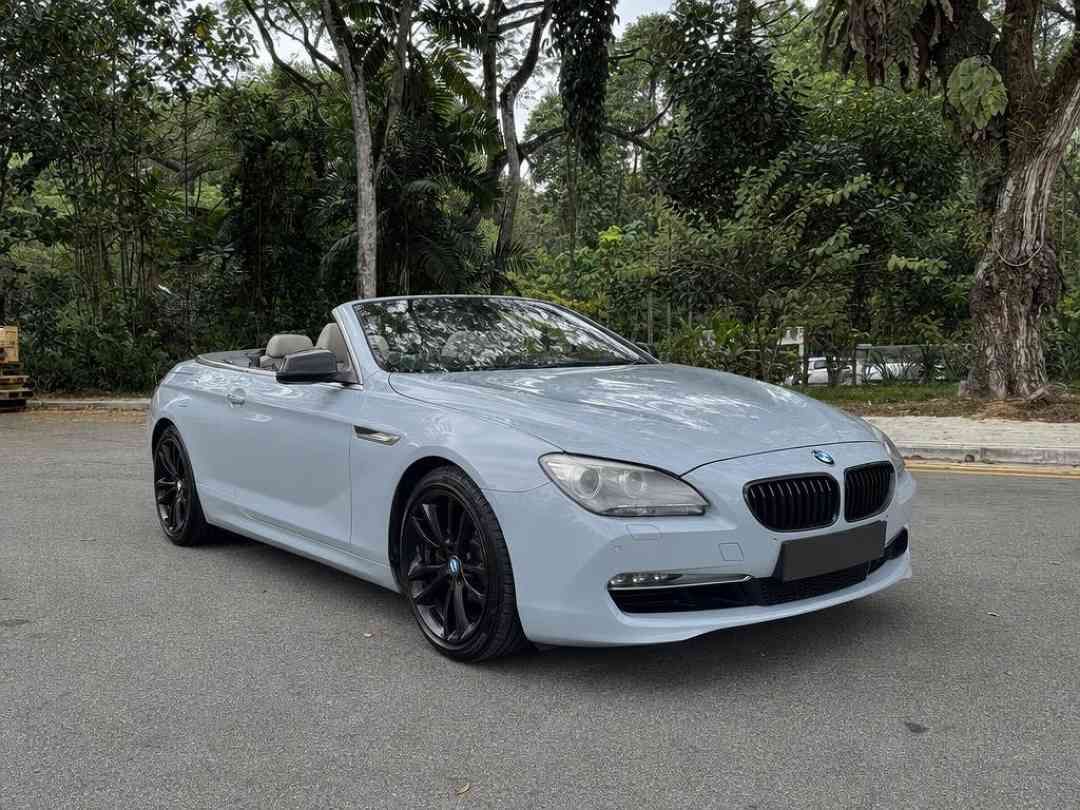 BMW 6 Series Convertible 640i (A) (Category: Used Cars) located in Singapore. Submitted by carousell_certified_partners (Listing ID 1462862339, Image 2). Description: Beautiful BMW 640i Cabriolet! Cheapest in SG! Lowest depreciation! Well kept unit! 100% full loan available! 12-24 Months Warranty by MTM Available! Buy with confidence! In house loan or bank loan available! Fast and easy loan approval! All our vehicles has undergone a 120 points ch