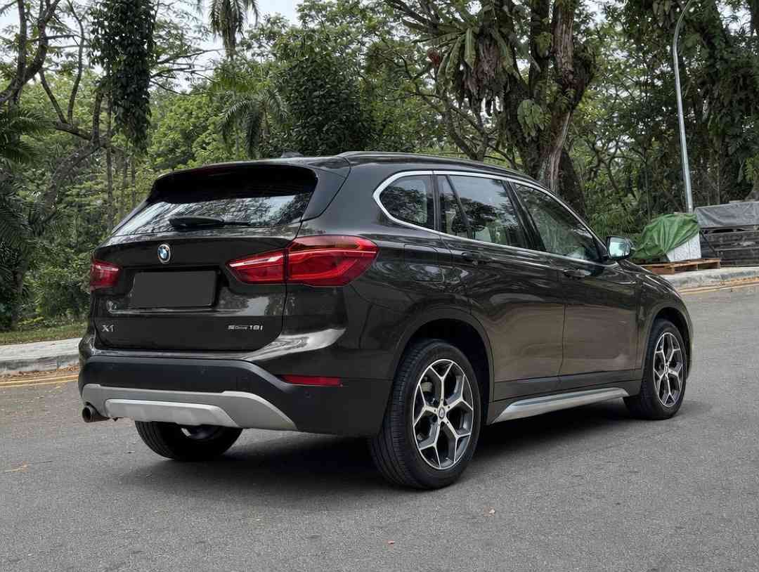 BMW X1 sDrive18i (A) (Category: Used Cars) located in Singapore. Submitted by carousell_certified_partners (Listing ID 1465503626, Image 3). Description: Spacious interior with premium features, making it ideal for both daily commutes and family outings. A stylish and versatile SUV that offer the best of both worlds. Very well-maintained model with nice carplate! Trade in available. Flexible and competitive financing option available. Features: R