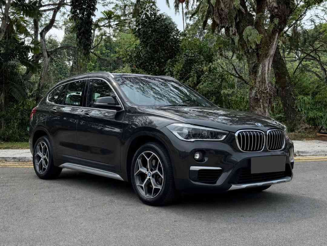 BMW X1 sDrive18i (A) (Category: Used Cars) located in Singapore. Submitted by carousell_certified_partners (Listing ID 1465503626, Image 2). Description: Spacious interior with premium features, making it ideal for both daily commutes and family outings. A stylish and versatile SUV that offer the best of both worlds. Very well-maintained model with nice carplate! Trade in available. Flexible and competitive financing option available. Features: R