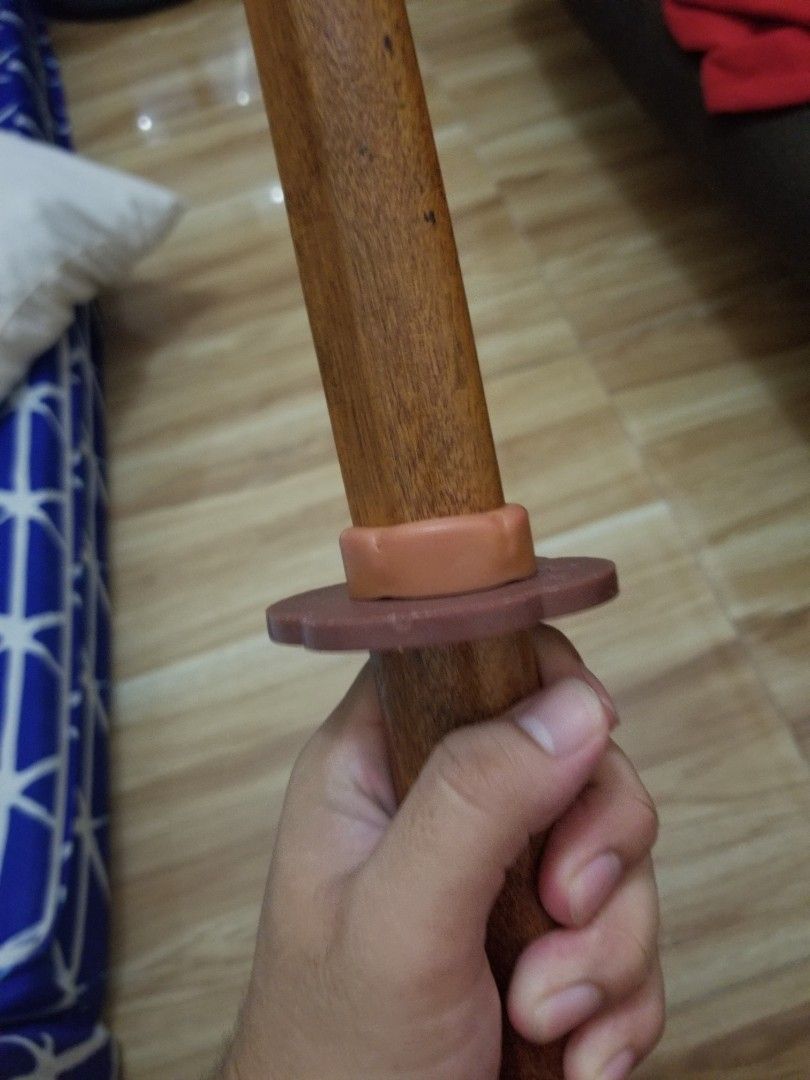 Bokken, wooden katana (Category: Combat Sports) located in Paranaque City. Submitted by m4rkjulius07672 (Listing ID 1467474488, Image 2). Description: - Solid wooden practice sword, perfect for martial arts and training routines - Natural wood finish showcasing a beautiful grain texture - Includes a brown hand guard and stopper ring near the handle - Smooth grip surface for comfortable handling - Solid pommel end with sturdy, durable construction